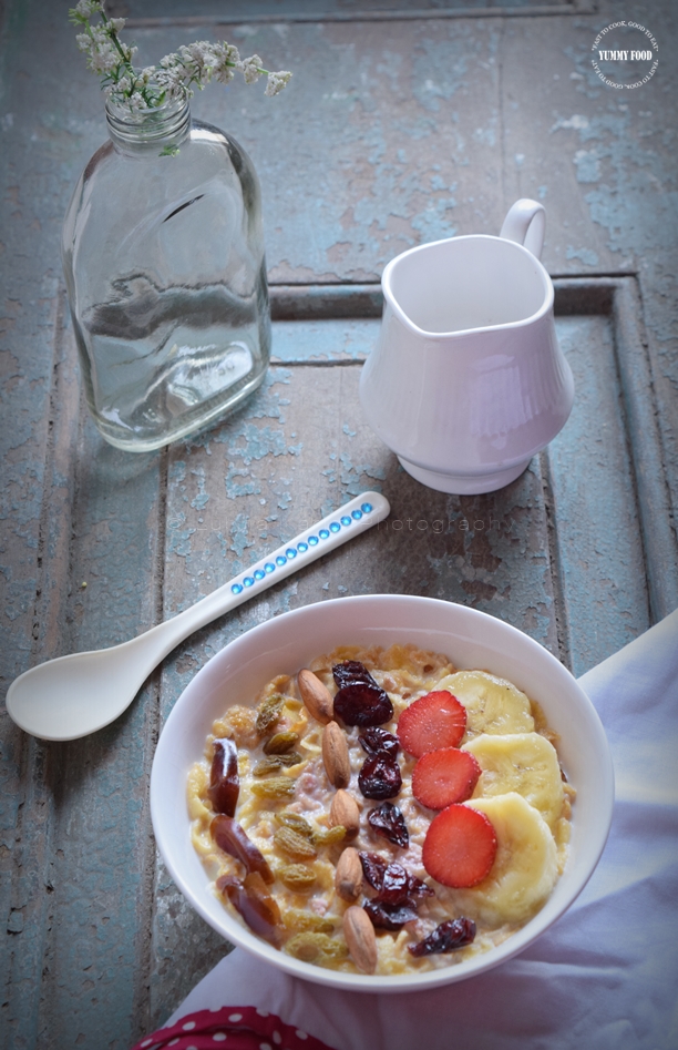 Warm Oatmeal Bowl with Fruits and Nuts